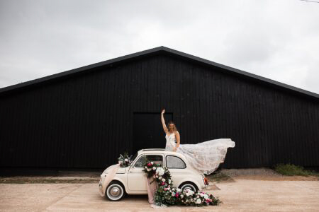 Bride in Vintage Fiat 500 at Silchester Farm