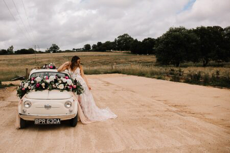 Bride in Vintage Fiat 500 at Silchester Farm